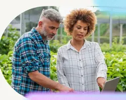 Diverse individuals discussing ESG transformation for an organisation